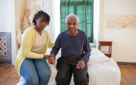 woman caring for older man