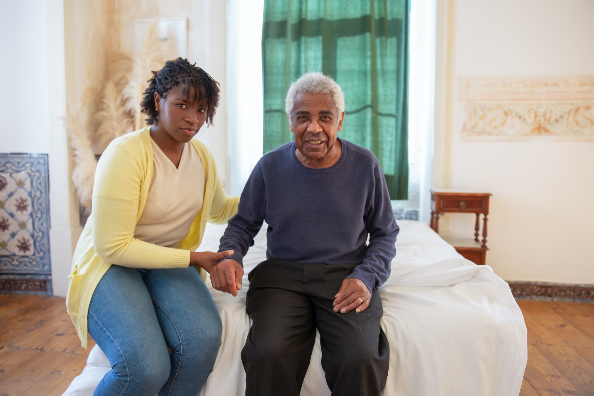 woman caring for older man